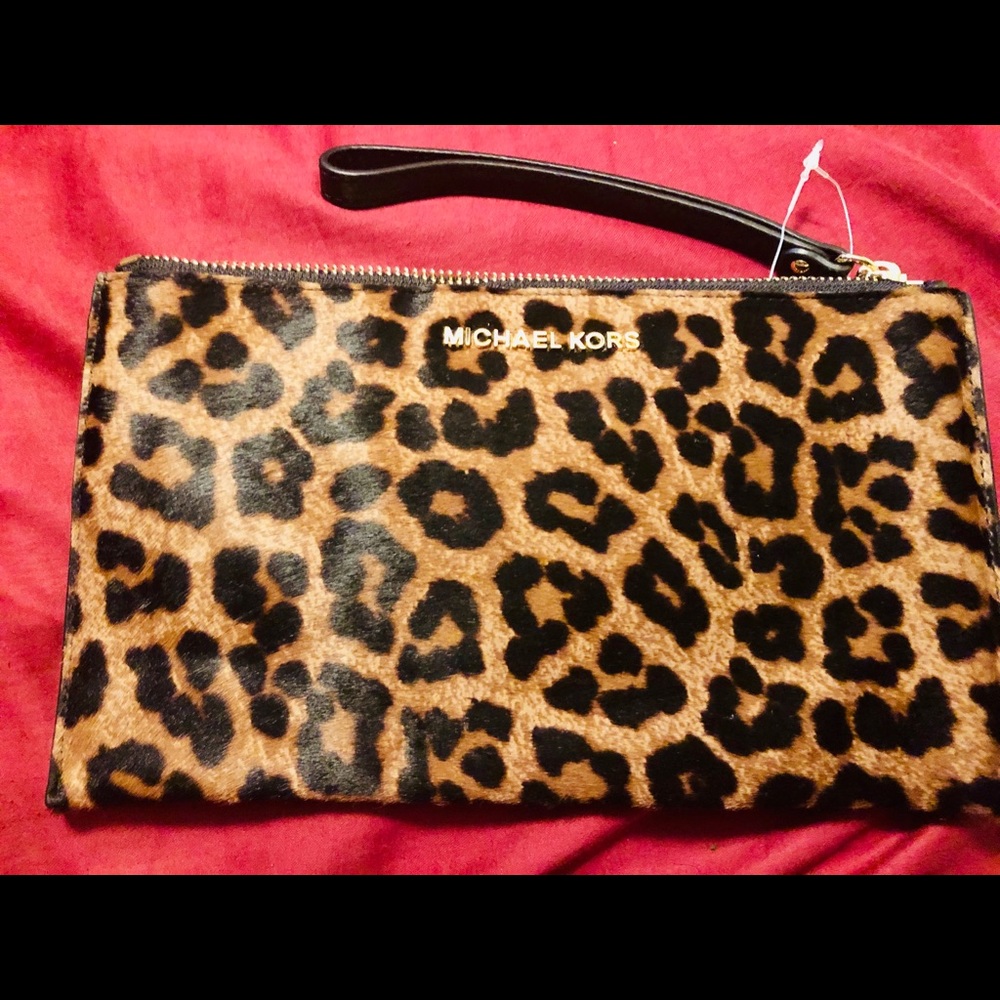 Authentic MK Leopard wristlet  soft material